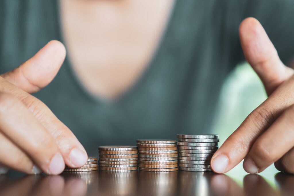 Business,Financial,Success,Concept.,Gold,Coins,On,Table,And,Green